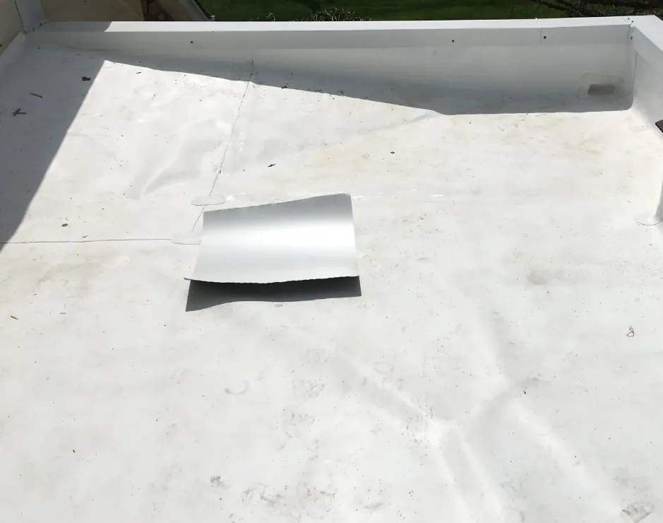 Hail damage on a commercial roof in Abilene, TX